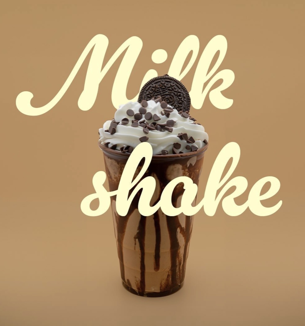 Chocolate milkshake with whipped cream and Oreo